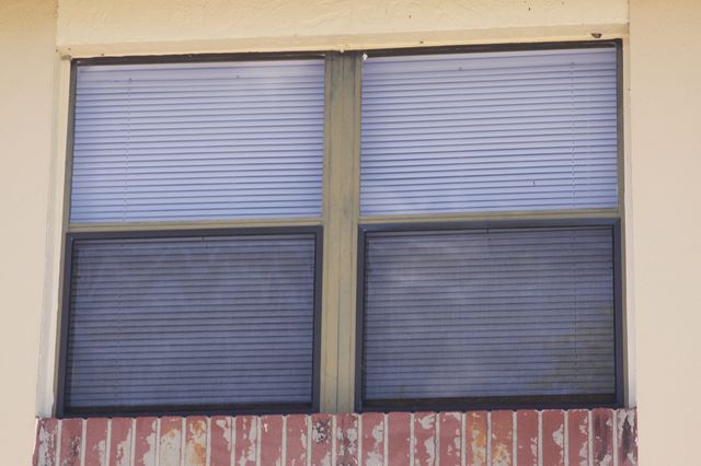 Bronze aluminum windows badly faded